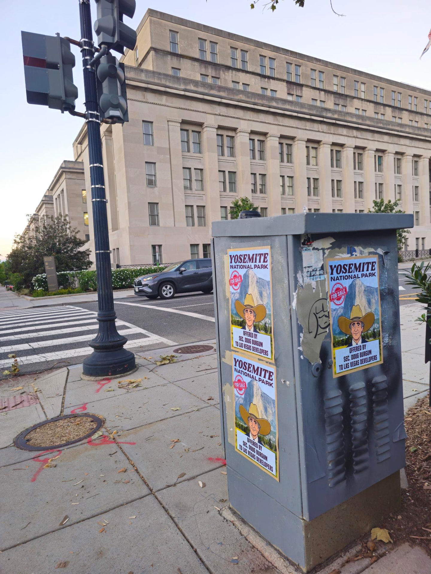 Yosemite for sale posters on a street corner utility box